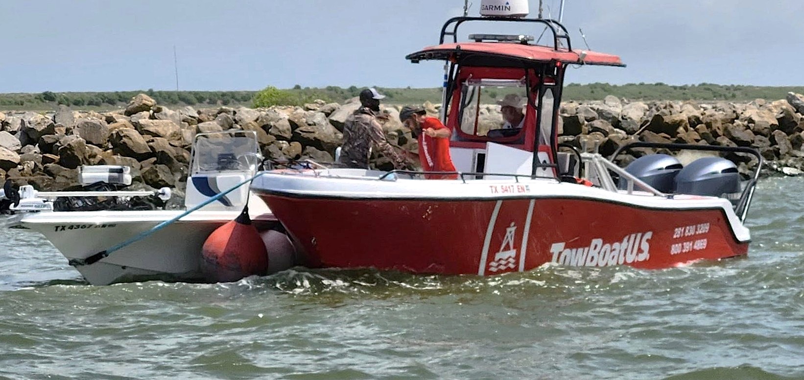TowBoatUS Galveston providing on-water assistance to a boater. 